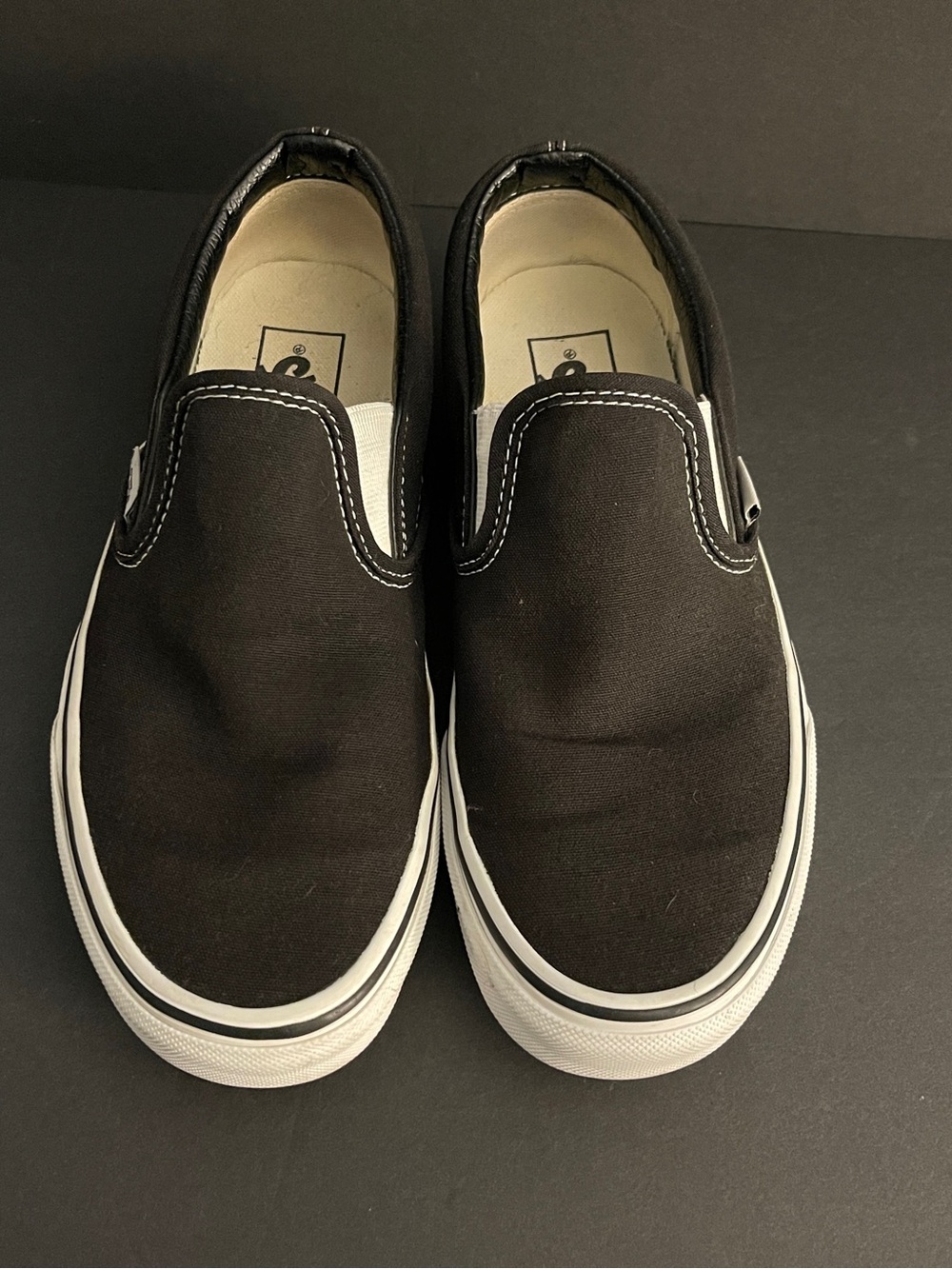 Vans Black Slip-On Canvas Sneakers with White Trim